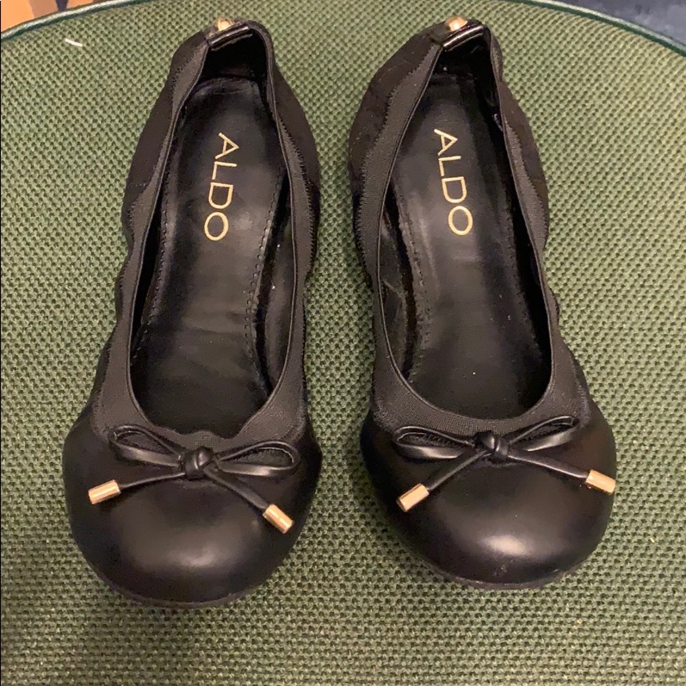 Black Aldo flats.